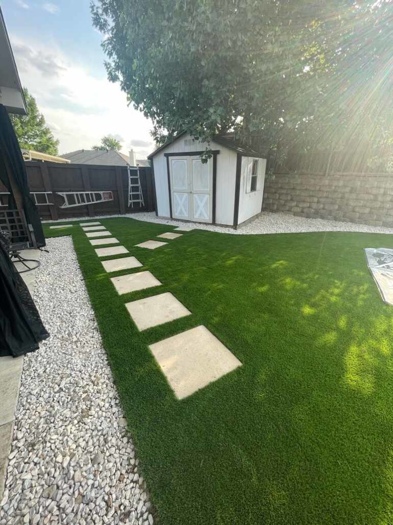 Backyard turf and pavers installation by Allegiance Turf, Texas