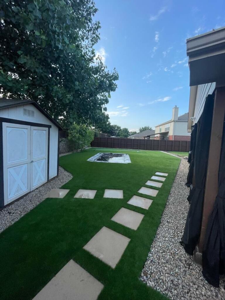 Backyard turf and pavers installation by Allegiance Turf, Texas